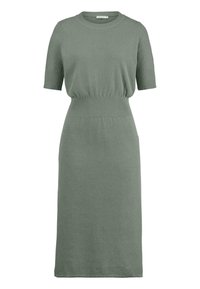Abito lavorato a maglia in verde tenue, con scollo rotondo a coste e maniche corte. La vita elastica si unisce a una gonna dritta e aderente.