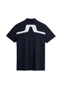 Tummansininen polo-paita, jossa on valkoinen geometrinen kuvio takana, lyhyet hihat, klassinen kaulus ja sileä, kevyt rakenne.