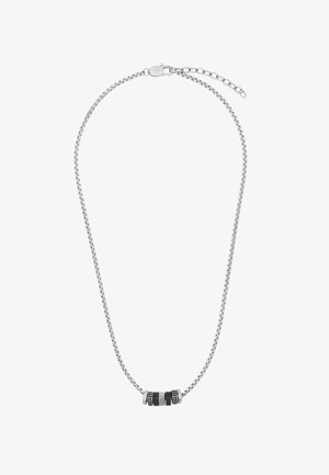 Silberne Halskette mit einem kleinen zylindrischen Anhänger, der schwarze und silberne geriffelte sowie gepunktete Segmente aufweist.