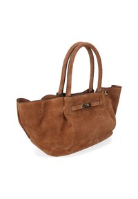 Sac fourre-tout en suede marron avec deux poignées arrondies et un fermoir décoratif. Le sac possède une texture douce et un design spacieux et ouvert.