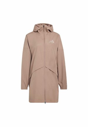 Lichte beige jas met capuchon, ritssluiting aan de voorkant en een oversized pasvorm. Voorzien van elastische manchetten en een subtiel logo op de bovenborst.