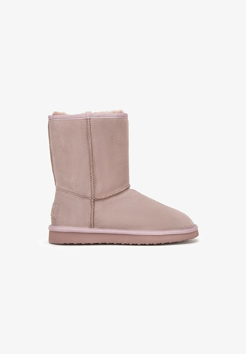Mid-height pink suede winter boot with plush lining, flat sole, and visible stitching, designed for cold weather comfort.