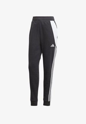 Pantalones deportivos negros de tejido suave, con rayas blancas en los laterales, una cinturilla elástica y un pequeño logo en el muslo superior.