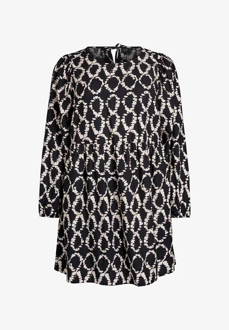Musthave pikkade varrukatega must kleit, millel on ümmargune kaelus ja tagakinnitus. Sellel on valge abstraktne ovaalne muster ning kihiline seeliku disain. Pehme kangas.