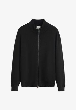 Cardigan noir en maille avec fermeture éclair intégrale, col, poignets et ourlet côtelés, présenté à plat sur fond blanc.