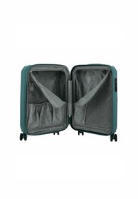 Valigia rigida color turchese con doppie compartimenti, tasche a rete con zip e rivestimento in tessuto. Dotata di doppie ruote e lucchetto a combinazione.