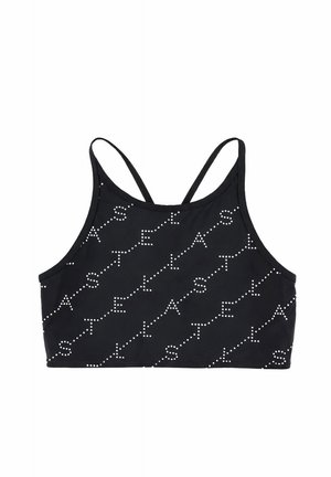 Zwarte atletische crop top met dunne schouderbandjes en witte stippenletters die een diagonaal patroon over de stof vormen.