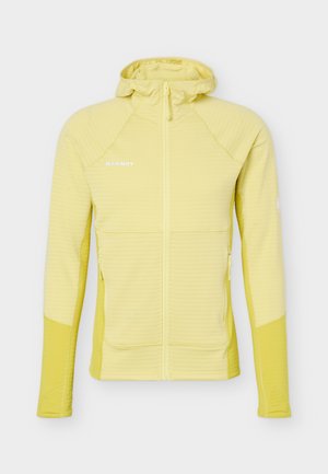 Hellgelbe Kapuzenjacke mit durchgehendem Reißverschluss, langen Ärmeln, seitlichen Reißverschlusstaschen und "Mammut"-Logo auf der Brust.