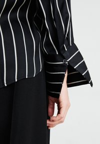 GAP Paitapusero - black