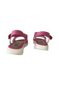 Sandali sintetici rosa con cinturini regolabili, suole bianche e una texture liscia. Progettati per comfort e facilità di utilizzo.