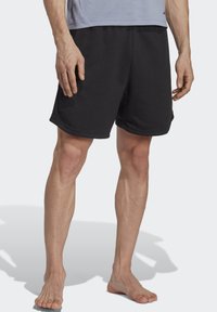 adidas Performance YOGA BASE - Sports shorts - black/carbon