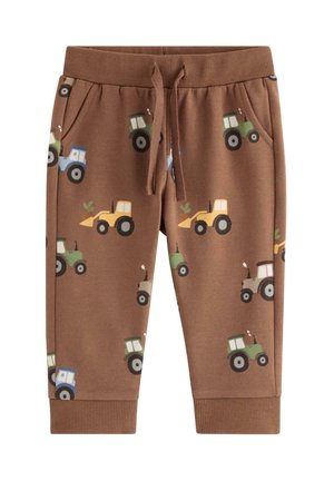 Brune børnesweatpants med grønne, blå, gule og beige traktor mønstre, elastisk talje, snøre og forlommer.