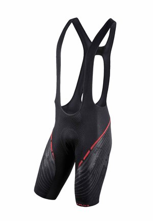Black cycling bib shorts with red accents and textured fabric, featuring shoulder straps and loose leg openings.
