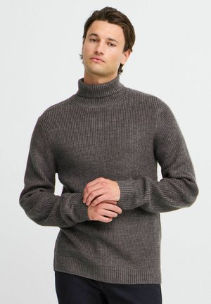 Suéter de cuello alto de canalé gris oscuro con mangas largas. Presenta un patrón de tejido texturizado y un cuello ajustado. Material suave.
