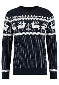 Marineblauwe gebreide trui met een patroon van witte rendieren en kerstbomen, voorzien van een stippenontwerp en ribgebreide manchetten en zoom.