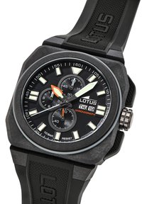 Black chronograph watch with textured rubber strap, circular face, white hour markers, and distinctive orange and green accents. Features date display.