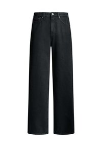 Fekete, bőszárú farmernadrág farmer anyagból, magas derékkal, ötpántos kialakítással és fém kiegészítőkkel. Texturált felület finom megkopással.