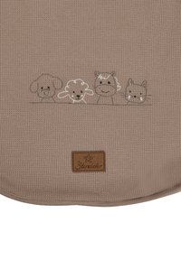 Beige textile with a textured pattern features four embroidered animal faces—dog, sheep, horse, and cat—above a small brown logo patch.