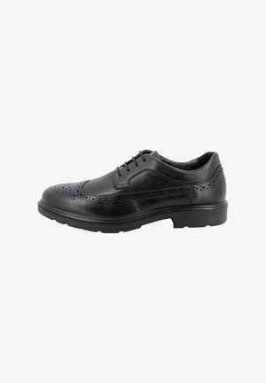 Scarpa da vestir nera in pelle con design wingtip, perforazioni dettagliate, punta rotonda e suola in gomma. Presenta cinque occhielli per l'inserimento dei lacci.