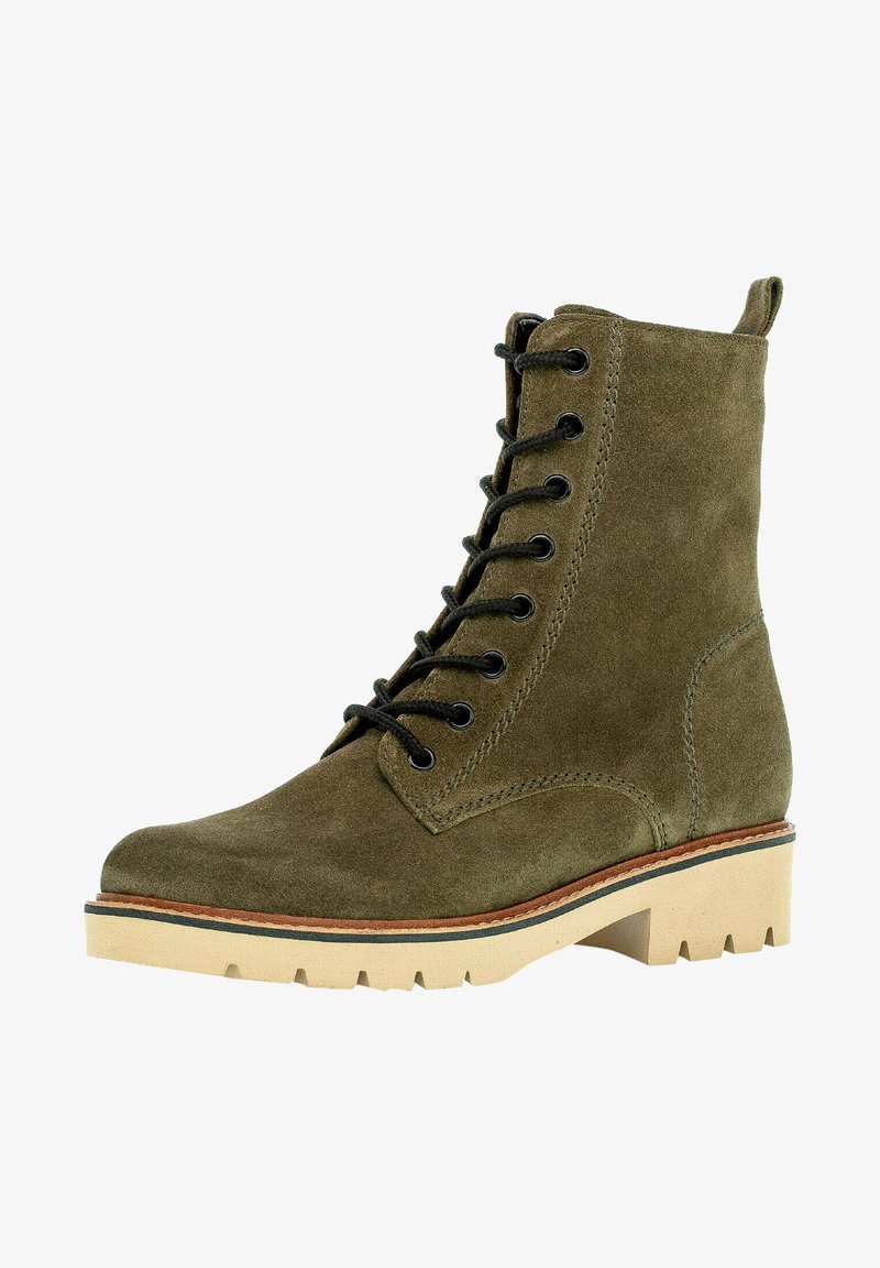 Olive suede ankle boot with black laces, round toe, and stitched detailing. Chunky beige sole with a textured pattern for traction.