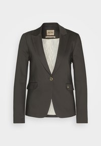 Blazer vert olive foncé sur mesure avec un bouton, revers crantés, deux poches avant à rabat et une doublure intérieure claire à motifs.
