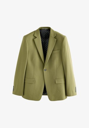 Olivgrüner Blazer mit Reverskragen, zwei Fronttaschen und einem einzelnen Knopfverschluss. Das Futter hat einen schwarzen Hintergrund mit weißen Punkten.