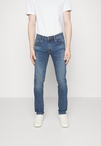 Redefined Rebel COPENHAGEN  - Traperice uskog kroja - medium blue
