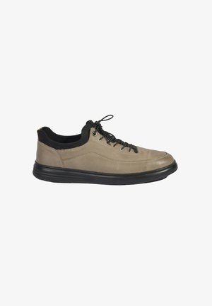 Light brown leather sneaker with black accents, smooth texture, round toe, and lace-up design. Features a black rubber outsole.