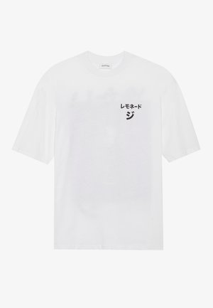 White cotton t-shirt with short sleeves, featuring black text in Japanese on the left chest area. Simple round neckline, relaxed fit.