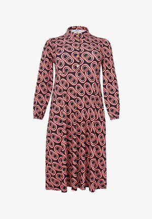 Long-sleeve dress in black, featuring a repeating red and white oval pattern. Button placket at the collar and gathered cuffs.