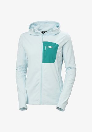Sudadera con capucha azul claro con cremallera, con un bolsillo en el pecho color verde azulado que incluye un logo blanco "HH" y capucha, sobre un fondo blanco.