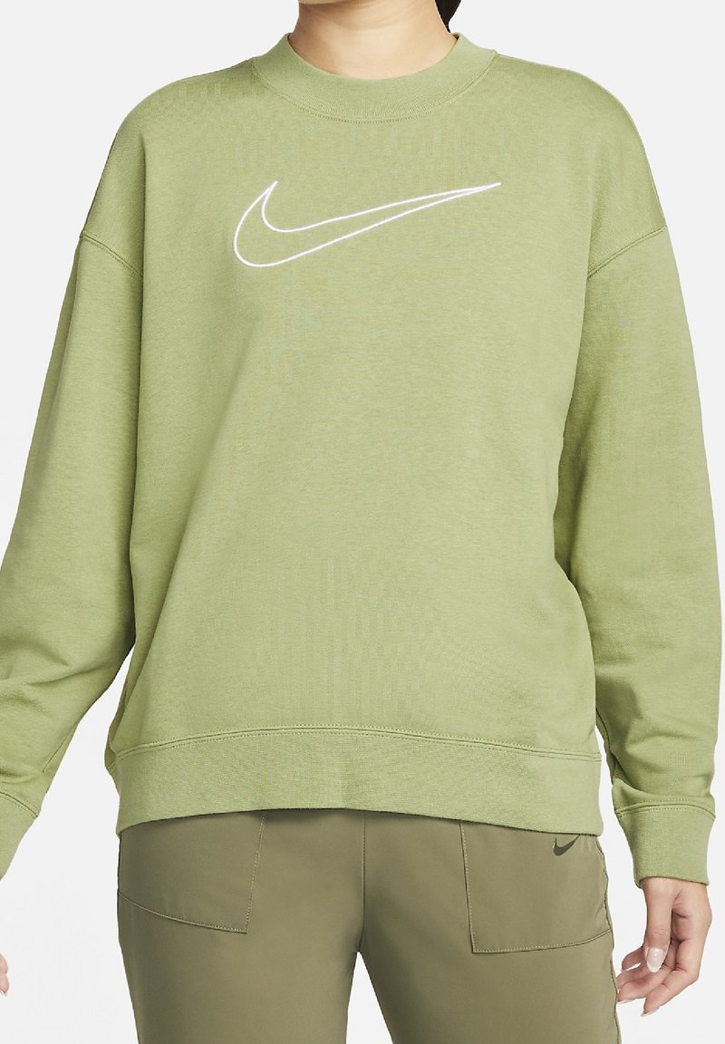 Sweatshirt vert clair avec un col rond, des épaules tombantes et un logo Nike blanc sur la poitrine. Tissu doux, coupe décontractée, poignets côtelés.
