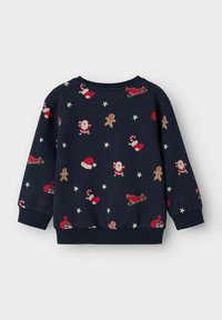 Sudadera de color azul marino con un estampado festivo de Papá Noël, hombres de jengibre, bastones de caramelo y estrellas, con puños y cuello acanalados.