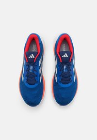 adidas Performance SUPERNOVA STRIDE - Road running shoes - blue/footwear white/team royal blue