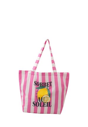Vaaleanpunavalkoraidallinen kangaskassi, jossa sitruunakuva ja teksti "Sorbet Au Soleil" edessä, kahdet sopivat kahvat.