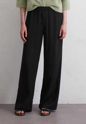 FLIESSENDE WIDE  - Trousers - black