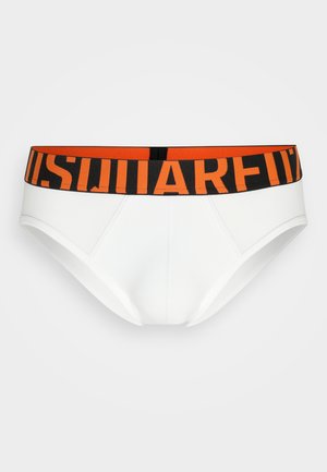 Culottes blanches avec une ceinture élastique orange et noire comportant le texte "SQUARE". Le tissu est lisse avec une coupe ajustée.