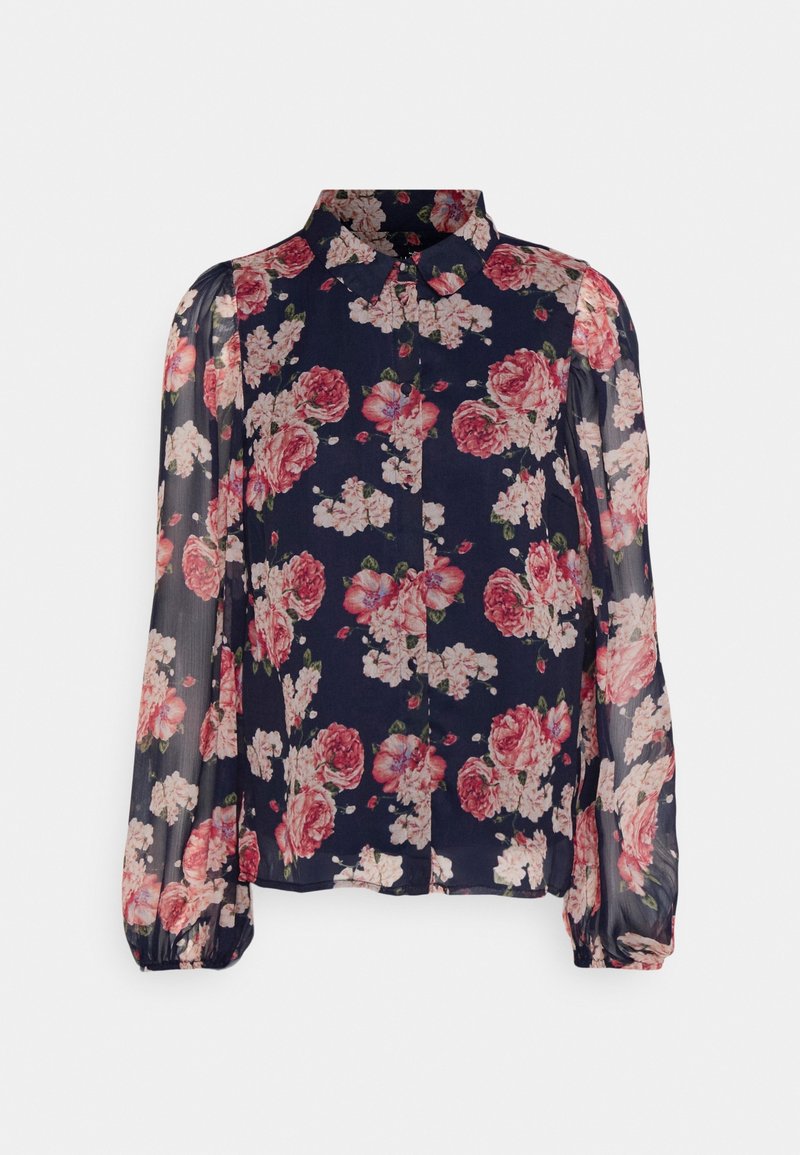 Blouse en voile marine avec manches longues bouffantes et motif floral rose, dotée d'un col classique et d'une fermeture boutonnée à l'avant.