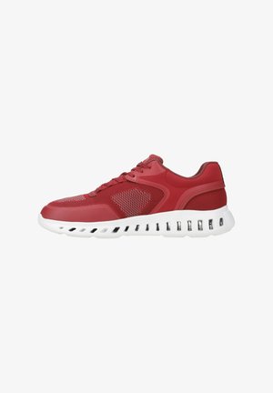 Red athletic shoes with mesh and synthetic upper, white midsole with cutout accents, and textured rubber outsole. Laces in matching red.