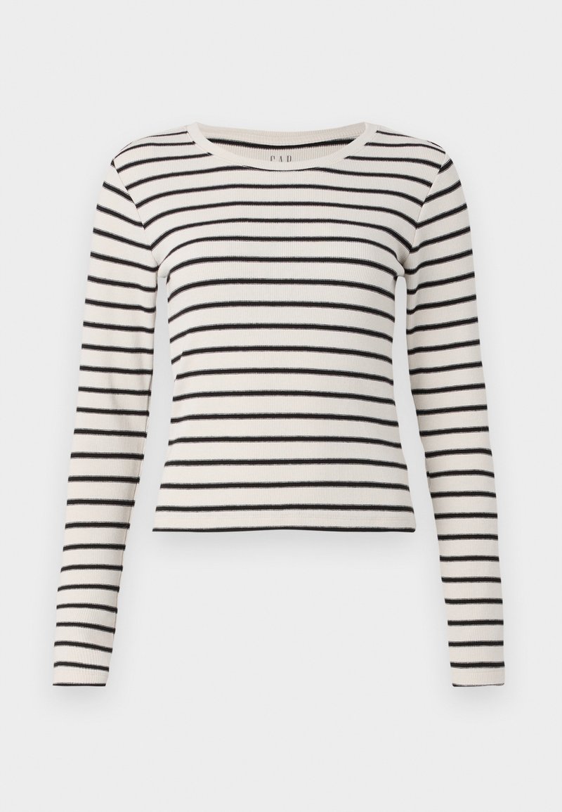 T-shirt à rayures longues en crème et noir. Présente un col rond, une texture côtelée et un design ajusté avec des rayures horizontales.