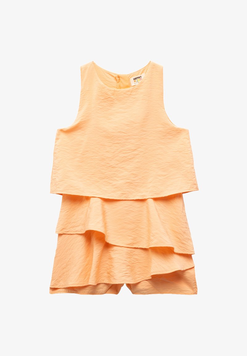 Gelaagd mouwloos jurkje in lichtoranje stof met een gestructureerde afwerking. Heeft een ronde halslijn en een sleuteltje-achter sluiting.