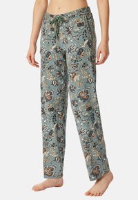 Blommönstrade, löst sittande pyjamasbyxor i dämpad teal, med dragsko i midjan och mjukt, lätt material för komfort.
