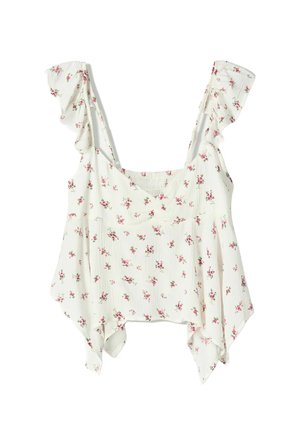 Vit blommig topp med volanger på axelbanden, som har en lös passform och texturerad tyg med små rosa blommor utspridda över ytan.