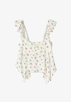 White floral top with ruffled straps, featuring a loose fit and textured fabric with small pink flowers scattered across the surface.
