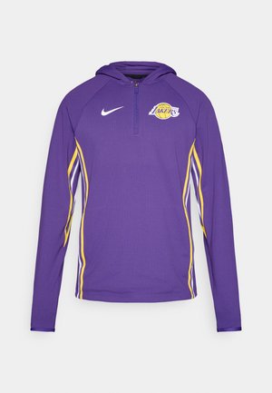 Lila langärmliger Kapuzenpullover mit gelben Seitenstreifen und einem Lakers-Logo, halb gebrochenem Reißverschluss-Kragen und einer Textur für Atmungsaktivität.
