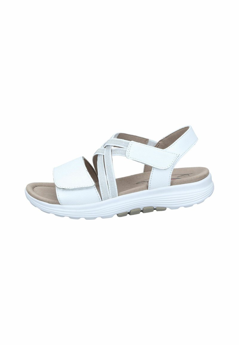 Sandalía blanca con múltiples correas cruzadas y cierre ajustable. Plantilla suave con suela texturizada y acolchado. Diseño ligero y flexible.