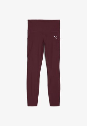 Leggings de sport bordeaux fabriqués à partir d'un tissu extensible et lisse, avec une taille haute, des poches latérales et un petit logo blanc sur la jambe.