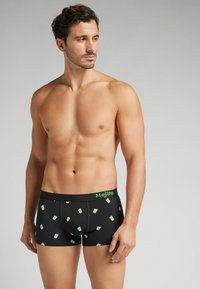 Černé boxerky s zeleným páskem "Mojito", zdobené vzorem malých koktejlových sklenic v zelené a bílé barvě, hladká tkanina.