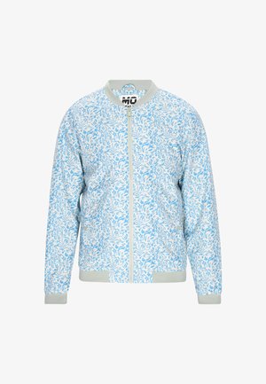 Kerge bombersjakker helesinisena, lillelise mustriga, lukuga, ribidega mansettide ja alläärega ning kontrastse helesinise kraega.