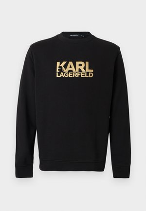 Zwarte crewneck-trui met lange mouwen en een gouden "KARL LAGERFELD"-logo op de borst.